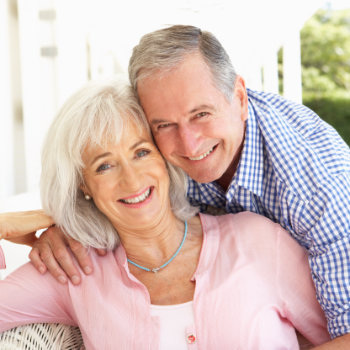 cheerful and laughing elderly couple