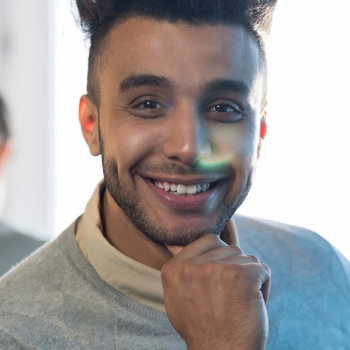 handsome hispanic man with a healthy smile