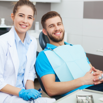 young man in a dentist office