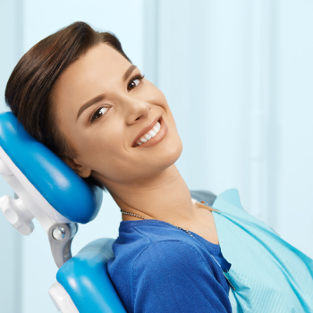 smiling woman on dentist chair