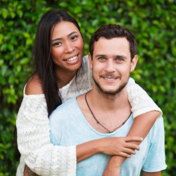 young couple with beautiful smiles