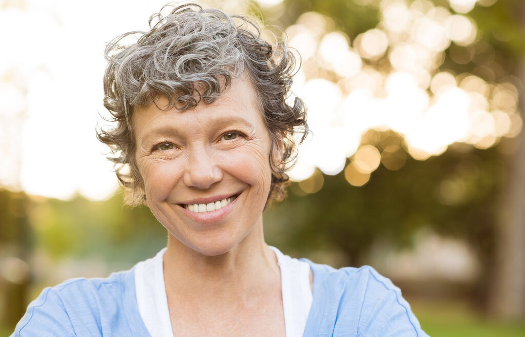 Start the New Year with a New Smile at Duluth Dental Studio 6 Smiling person outdoors