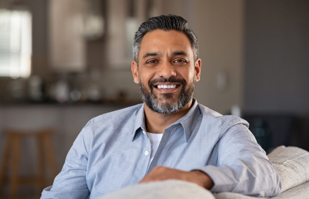 Could Loose Teeth Mean I Have Gum Disease? 5 Man with a confident smile