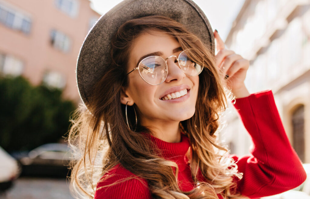 Red, Swollen, or Receding Gums? You May Need Periodontal Therapy 4 Woman smiling with bright teeth