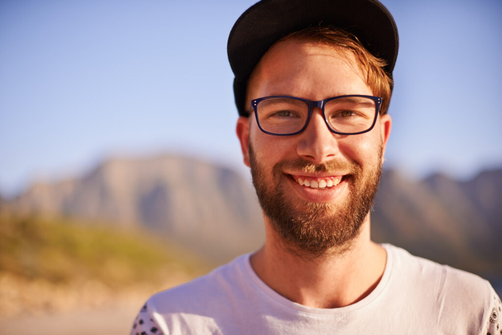 From Dull to Dazzling: The Magic of Modern Cosmetic Dentistry 8 Smiling man with healthy teeth