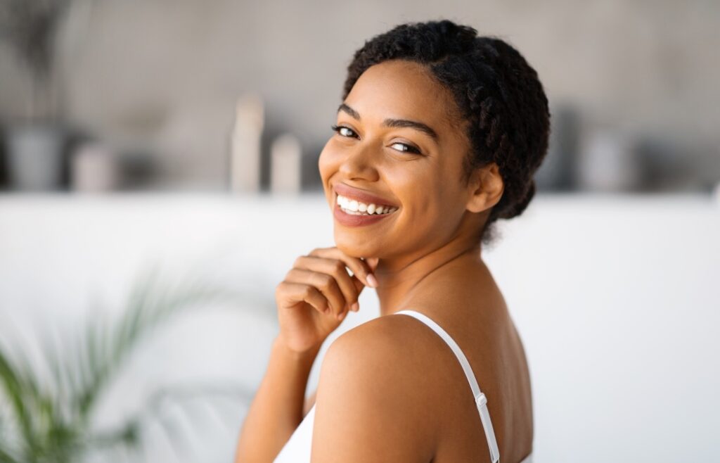 Love Your Smile with Porcelain Veneers 9 Smiling woman with a confident expression