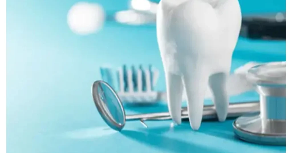 Dentist Specializing in Dental Implants for Natural, Long-Lasting Smile Restoration 5 Dental tools and tooth model showing precision care for implant treatment