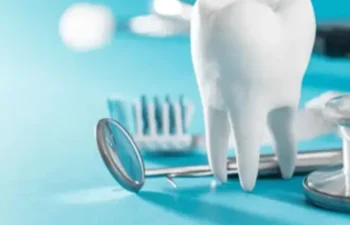 Dental tools and tooth model showing precision care for implant treatment