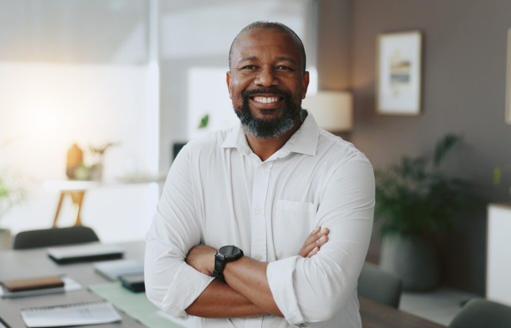 Keep Your Smile Healthy with Dental Implant Restorations 6 Smiling man after dental treatment
