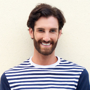 Confident young man smiling
