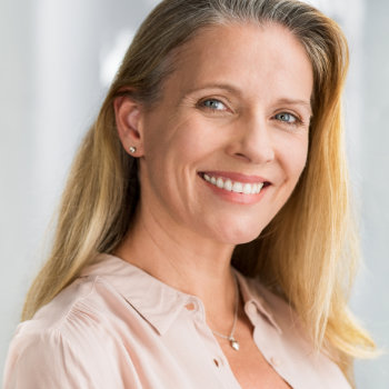 Mature woman smiling dental patient