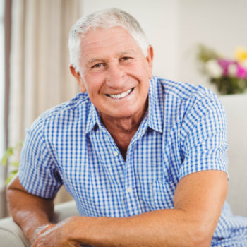 Senior man smiling confidently