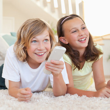 Pediatric DentistryDuluth siblings watching TV on floor care