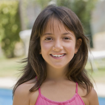 Smiling Hispanic girl Pediatric DentistryDuluth care visit
