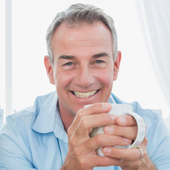Smiling middle aged men Duluth Dental Studio patient group