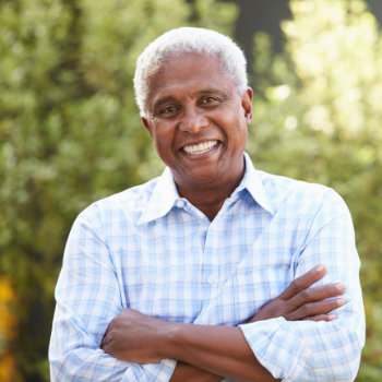 Smiling senior man with healthy teeth