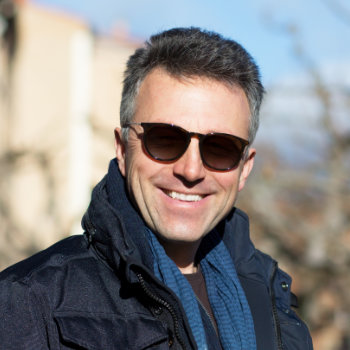 Happy man smiling in sunglasses