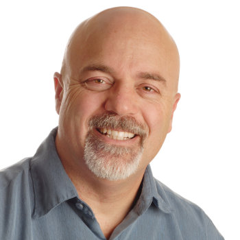 Middle aged man smiling Duluth Dental Studio patient image