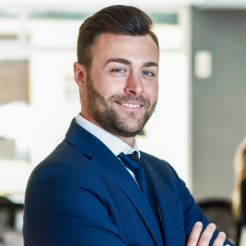 Smiling handsome businessman Duluth Dental Studio patient