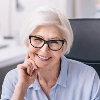 Smiling senior woman with glasses