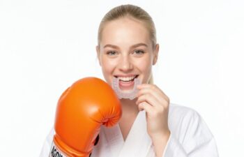 Athlete wearing athletic mouthguard Duluth sports safety