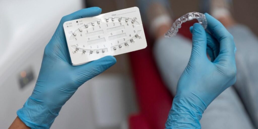 Athletic mouthguard Duluth shown during dental fitting exam